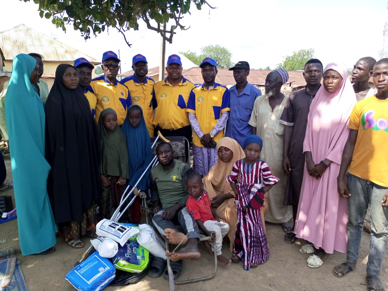 GINMI representatives with the Distressed DSP Abubakar Adamu.